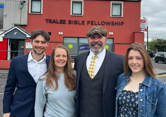 Pastor Josh Steward with his family outside the church